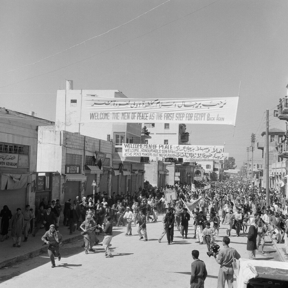 ubb-jg-n-0245-01: Demonstration in connection with the establishment of the UNEF peacekeeping operation in Gaza after the Suez Crisis. Gaza City, March 1957.